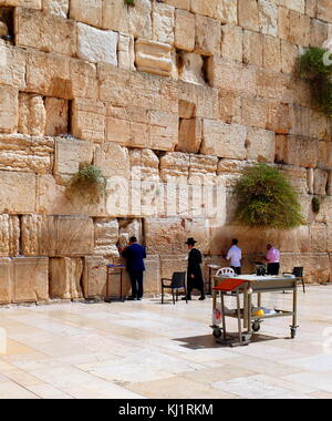 The Western Wall, Wailing Wall or Kotel; an ancient limestone wall in the Old City of Jerusalem, Israel. The wall was originally erected as part of the expansion of the Second Jewish Temple by Herod the Great Stock Photo