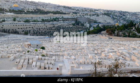 View from the Mount of Olives across the Kidron Valley to the Mosque of Omar and the Temple Mount, Jerusalem, Israel. In the foreground is The Jewish Cemetery on the Mount of Olives, including the Silwan necropolis, is the most ancient and most important cemetery in Jerusalem. Burial on the Mount of Olives started some 3,000 years ago in the First Temple Period, and continues to this day Stock Photo