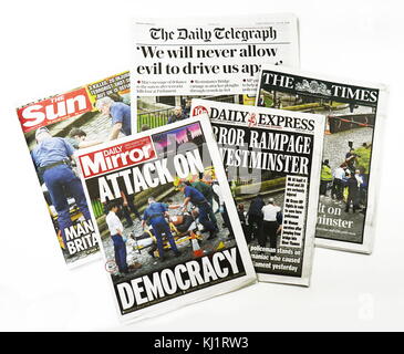 British newspaper front page headlines after the 22 March 2017, terrorist attack, on Westminster Bridge, and Parliament, in central London. The attacker drove a vehicle into pedestrians on Westminster Bridge and a crowd of people near the palace gates, then fatally stabbed a police officer Stock Photo