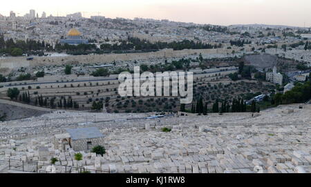 View from the Mount of Olives across the Kidron Valley, Jerusalem, Israel. In the foreground is The Jewish Cemetery on the Mount of Olives, including the Silwan necropolis, is the most ancient and most important cemetery in Jerusalem. Burial on the Mount of Olives started some 3,000 years ago in the First Temple Period, and continues to this day Stock Photo
