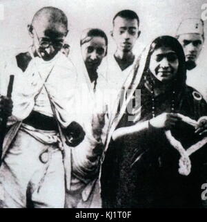 Mahatma Gandhi with Sarojini Naidu, during a Salt March in 1930. Sarojini Naidu (1879–1949), served as the first governor of the United Provinces of Agra and Oudh. Stock Photo