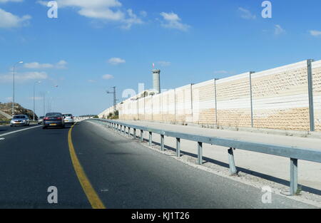 Security Wall built by Israel to separate the Jewish and Palestinian areas along key routes through the Occupied West Bank of Palestine Stock Photo