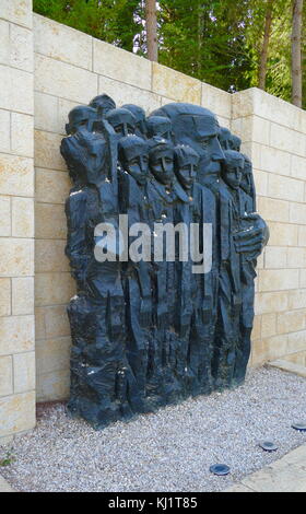 Korczak and the Ghetto's Children, sculpture by Boris Saktsier (1978), Yad Vashem Memorial, Israel. Janusz Korczak, the pen name of Henryk Goldszmit, (1878– 1942), was a Polish-Jewish educator, children's author, and paediatrician. After spending many years working as director of an orphanage in Warsaw, he refused sanctuary repeatedly and stayed with his orphans when the entire population of the institution was sent from the Ghetto to the Treblinka extermination camp, during the Grossaktion Warsaw of 1942 Stock Photo