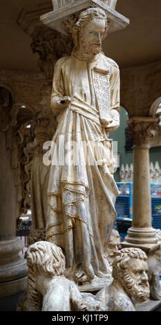 A column carved to look like Saint Peter one of the Twelve Apostles of Jesus Christ. Dated 13th Century Stock Photo