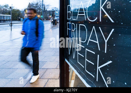 Edinburgh, Scotland, UK. 21st Nov, 2017. In preparation for Black Friday shops in Edinburgh's Princes Street advertise their pre-Christmas sales in order to boost a flagging high street performance. To prevent scenes of chaos many of the retailers have extended their sales up to two weeks in advance of 24th November, the traditional date when US retailers reduced their prices the day after Thanksgiving Day. Credit: Rich Dyson/Alamy Live News Stock Photo