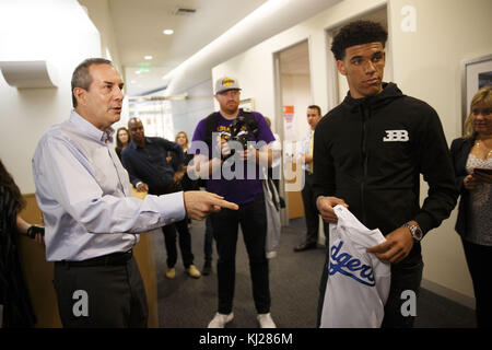 El Segundo, California, USA. 23rd June, 2017. Lon Rosen, executive vice president and chief marketing officer for the Los Angeles Dodgers, presents Lakers draft pick Lonzo Ball a jersey before throwing out the first pitch at Dodger Stadium on Friday, June 23, 2017 in El Segundo, California. The Lakers selected Lonzo Ball as the No. 2 overall NBA draft pick and is the son of LaVar Ball. © 2017 Patrick T. Fallon Credit: Patrick Fallon/ZUMA Wire/Alamy Live News Stock Photo