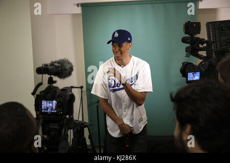 El Segundo, California, USA. 23rd June, 2017. Lakers draft pick Lonzo Ball  hangs out next to the dugout with friends and brother LaMelo Ball before  throwing out the first pitch at Dodger