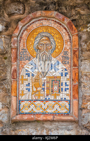 Icon-Mosaic, St. Peter Cetinjski, on the wall in Budva, Montenegro Stock Photo