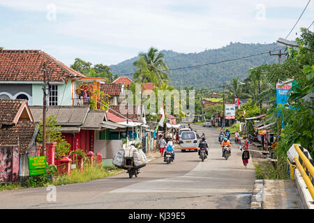 Street scene showing motorbikes in the coastal town Carita