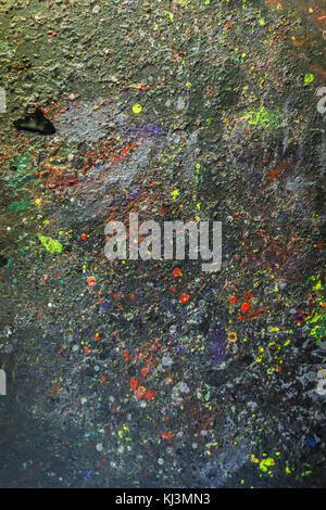 a set of paint stains on the dark background. copyspace. abstract splashes. vertical picture. Stock Photo
