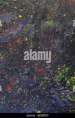 a set of paint stains on the dark background. copyspace. abstract splashes. vertical picture. Stock Photo
