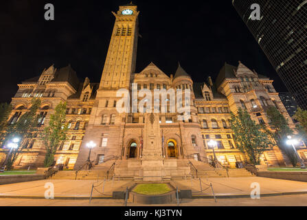 Toronto's Old City Hall at night. One of the largest buildings in Toronto and the largest civic building in North America upon completion in 1899. Stock Photo