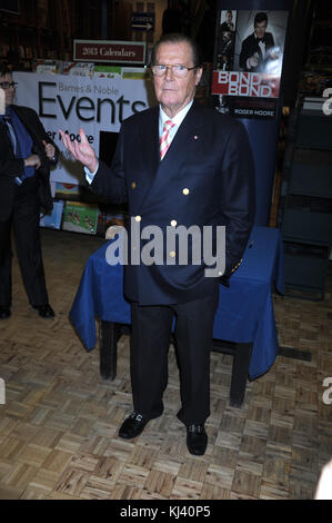 NEW YORK, NY - NOVEMBER 09:  Sir Roger Moore meets fans and signs copies of his book 'Bond on Bond' on November 9, 2012 in New York City.   People:  Sir Roger Moore Stock Photo