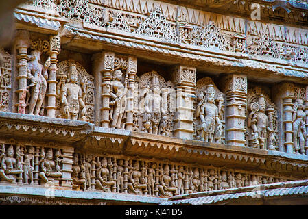 Carved idols on the inner wall of Rani ki vav, an intricately constructed step well. Patan in Gujarat, India. Stock Photo