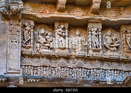 Carved idols on the inner wall of Rani ki vav, an intricately constructed step well. Patan in Gujarat, India. Stock Photo