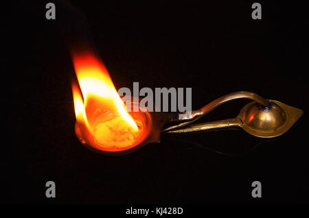 Close-up - Jyoti or flame of Kapur or Camphor. Pranav Ganesh Mandir, Chinmay Vibhooti, Kolvan, Taluka Mulshi, Pune, Maharashtra, India Stock Photo