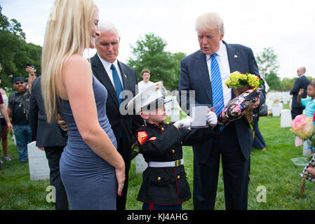 President Donald Trump is joined by Bernard Arnault CEO of LVMH Moet  Hennessy Carlos Sousa the general manager of Louis Vuitton Manufacturing  USA and Advisor to the President Ivanka Trump as they