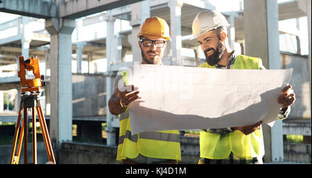 Team of architects people in group on construciton site Stock Photo