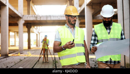 Team of architects people in group on construciton site Stock Photo