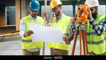 Team of architects people in group on construciton site Stock Photo