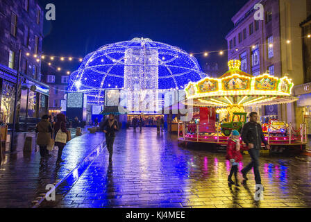 Christmas lights and entertainment  in George Street, Edinburgh Stock Photo