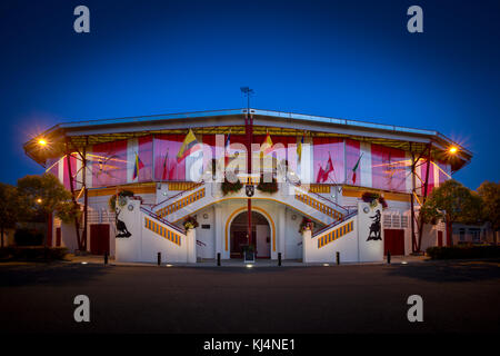 At dusk, a view of the exterior of the recently renovated Pomarez arena (40360) (Landes (40), Nouvelle-Aquitaine, France). Stock Photo