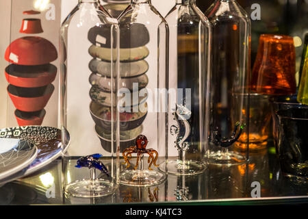 Decorative glassware for sale on Via Drapperie. Bologna city life, Italy. Stock Photo