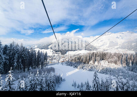 View from gondola lift to small city Werfenweng and Tennen mountains in Salzburg, Austria Stock Photo