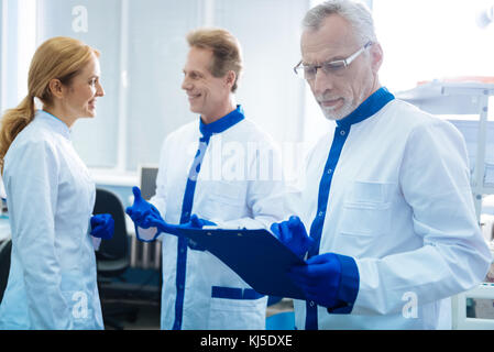 Experienced researchers working in the lab Stock Photo