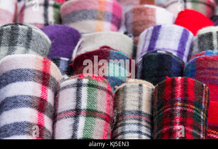 Tartan scarfs in souvenir shop on the Royal Mile in Edinburgh, Scotland. UK Stock Photo