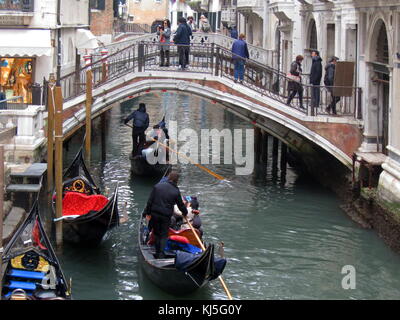Gondolas on a canal in Venice northern Italy Stock Photo