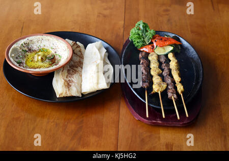 Mushtaque Rind Mutton and Chicken Mushkak Sticks Grilled Bar B Que (BBQ) with ...