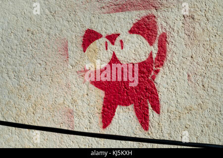 Red cat graffiti sprayed on a wall in Sibiu, Romania Stock Photo