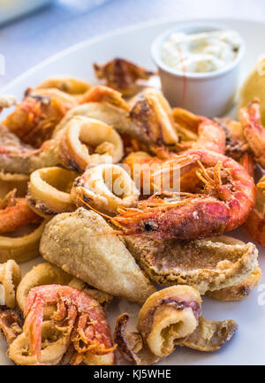 Mixed deep-fried fish, shrimp and squid platter Stock Photo