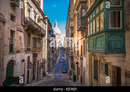 Street of Valletta with traditional balconies, Malta Stock Photo