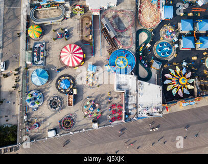 NEW YORK, USA - SEPTEMBER 26, 2017: Coney island amusement park aerial view. Located In southern Brooklyn along the waterfront it is a entertainment h Stock Photo