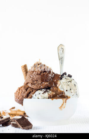 Homemade ice cream with chocolate and cookies in white bowl,selective focus and blank space Stock Photo