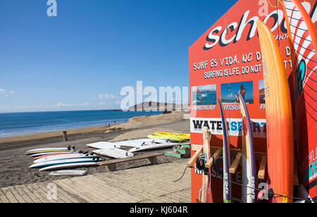 Surfer school, boards at the beach of El Medano, a popular surfer destination on Tenerife island, Canary islands, Spain Stock Photo