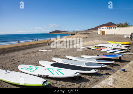 Surf boards at the beach of El Medano, a popular surfer destination on Tenerife island, Canary islands, Spain Stock Photo