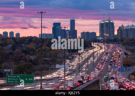 Traffic Congestion along the King's Highway 401 at sunset in Toronto, Ontario, Canada. Stock Photo