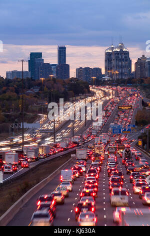 Traffic Congestion along the King's Highway 401 at sunset in Toronto, Ontario, Canada. Stock Photo