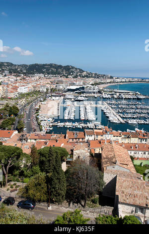 Cannes (south-eastern France): the city, the Old Port and the convention center 'palais des festivals et des congres' viewed from Le Suquet Tower Stock Photo