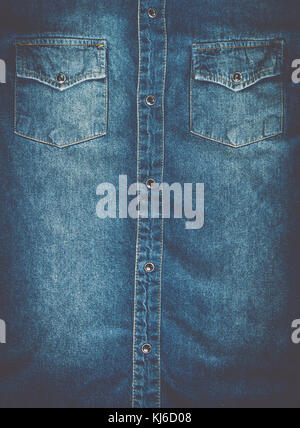 Close up denim jeans texture background with vintage filter. Stock Photo