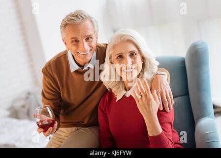 Excited elderly couple celebrating their engagement Stock Photo
