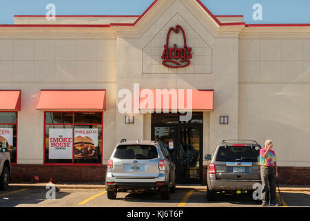 The exterior store front, shop front and entrance of Arby's fast food restaurant in Guthrie, Oklahoma; USA. Stock Photo