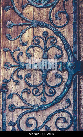 Background Texture Of An Ornate Hinge On A Church Door Stock Photo