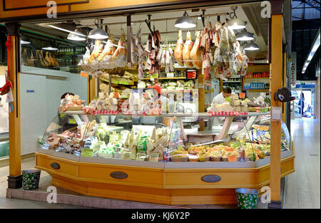 meat and cheese stall in indoor food market, florence, italy Stock Photo
