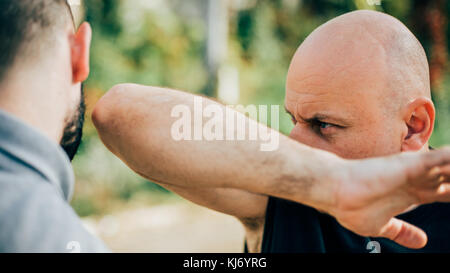 Street Fight One Man Fight With Other Street Fighting Self Defense Technique Stock Photo Alamy