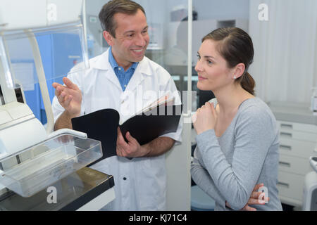 happy colelagues in modern office copy documents on machine Stock Photo