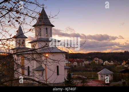 A white church and a beautiful sky in Romania Stock Photo